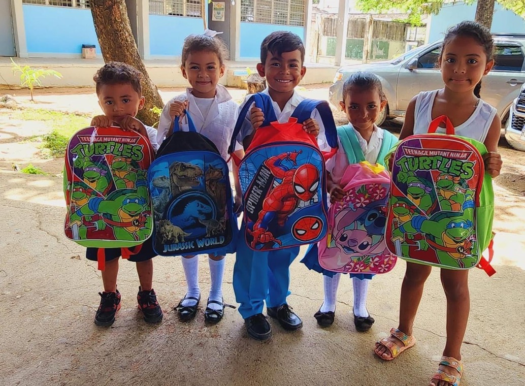 Children with backpacks